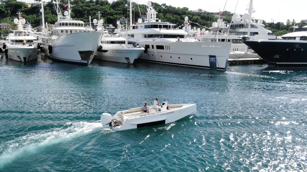 Iguana Original sailing with prestigious yachts around