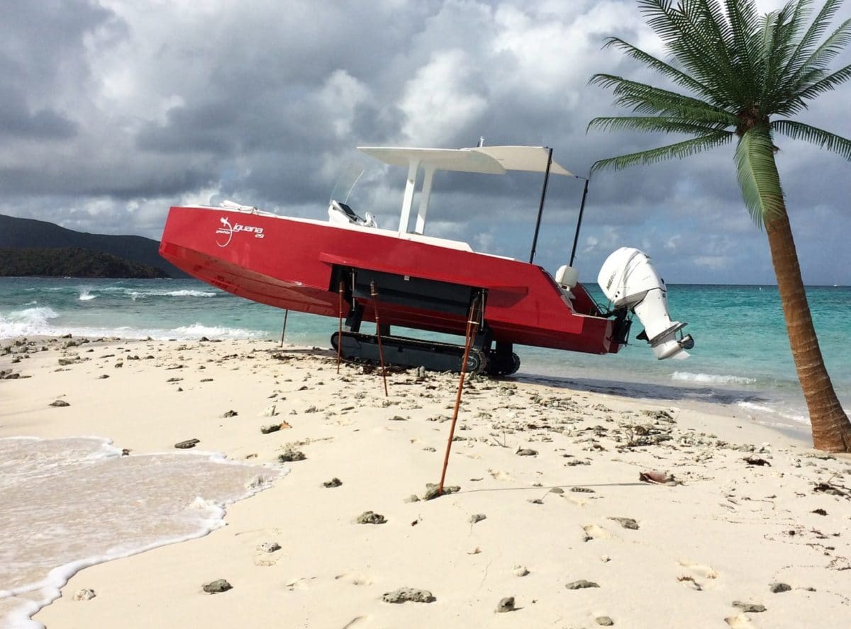 Amphibious boat with tracks on a private island