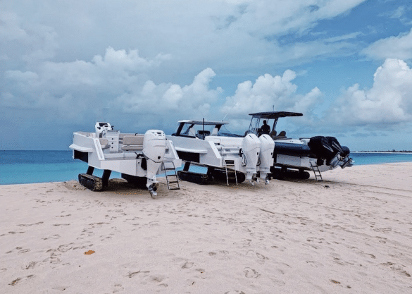 Amphibious boats with tracks on the beach