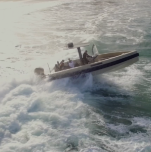 Amphibious Iguana boat facing waves