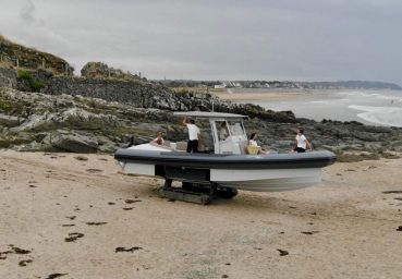 Iguana X-100 driving on the beach